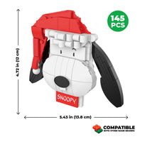 Snoopy toy figure with dimensions and compatibility information on a white background