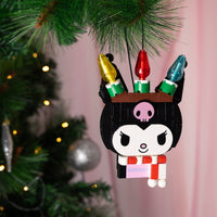 Decorative Kuromi ornament with colorful lights on a Christmas tree.