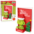 Plastic brick toy set inspired by 'How the Grinch Stole Christmas!' with packaging and toy model.