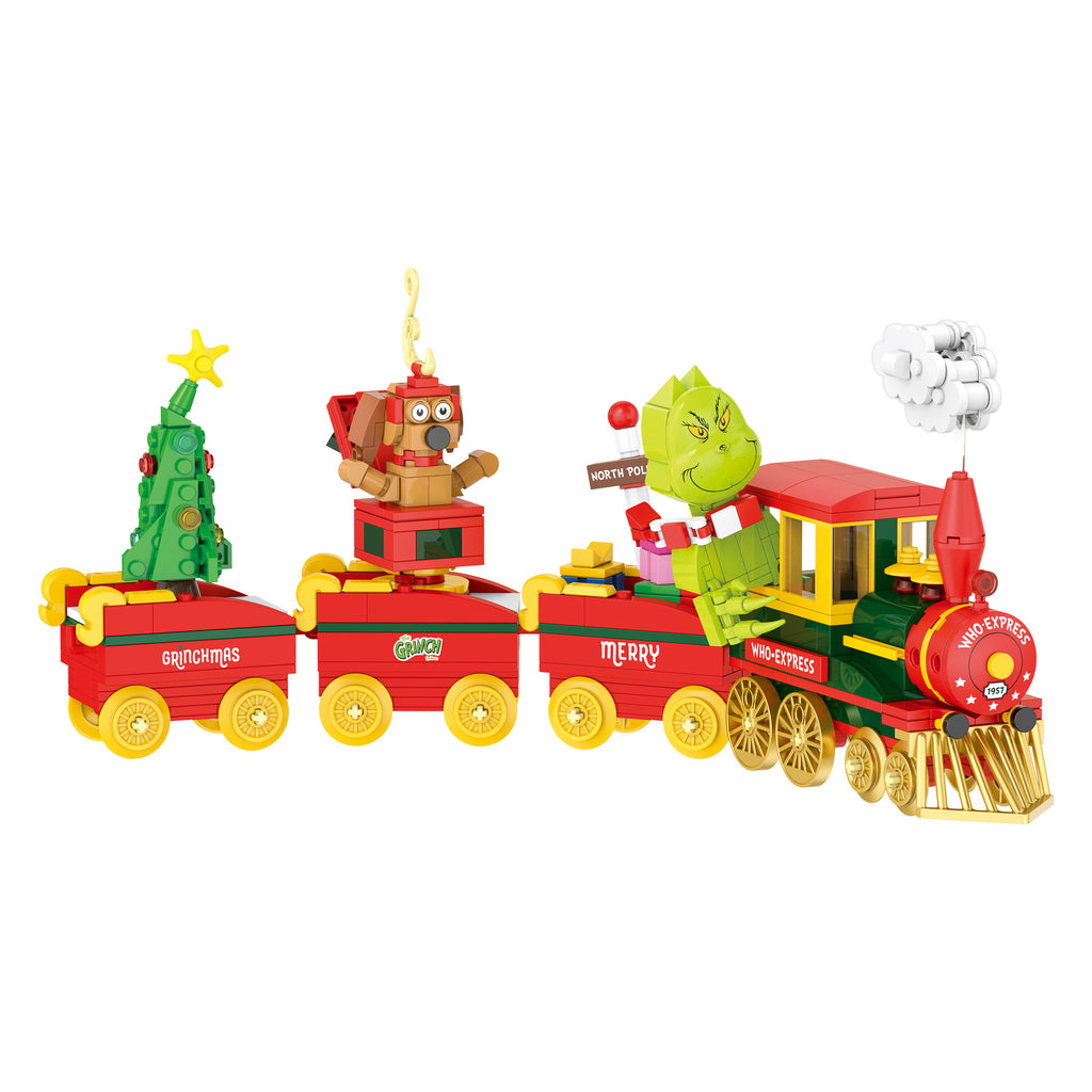 Toy train set with Christmas-themed decorations on a white background