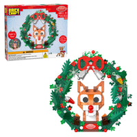 Christmas wreath with a Rudolph design and packaging on a white background