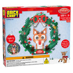Box of Brick Craft building set featuring a Rudolph wreath with light-up nose and display stand.