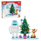 Brick Craft holiday-themed building set with a white creature, Christmas tree, and reindeer in front of its packaging.