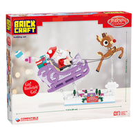Brick Craft building set packaging featuring Santa Claus in a sleigh with Rudolph the Reindeer.