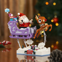 Brick Santa Claus in sleigh with reindeer against a festive background