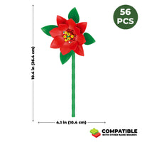 Red flower-shaped toy with green leaves and measurements on a white background