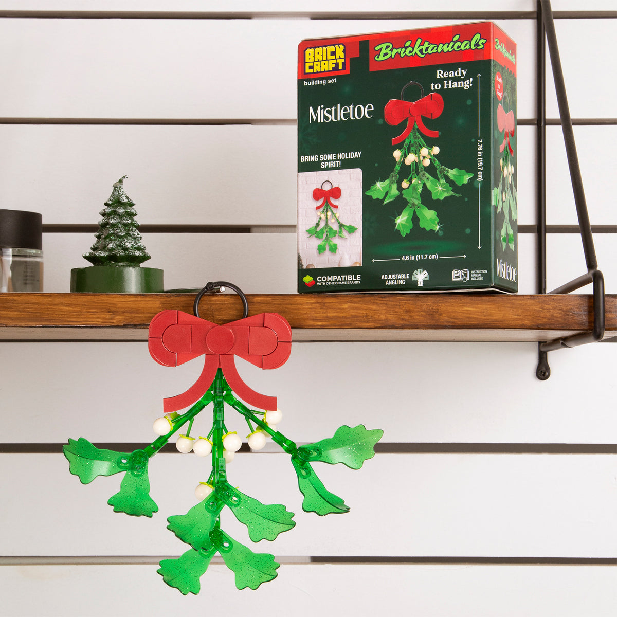 Mistletoe ornament with packaging on a shelf