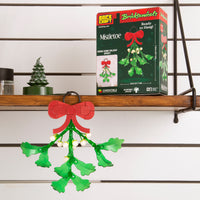 Mistletoe ornament with packaging on a shelf