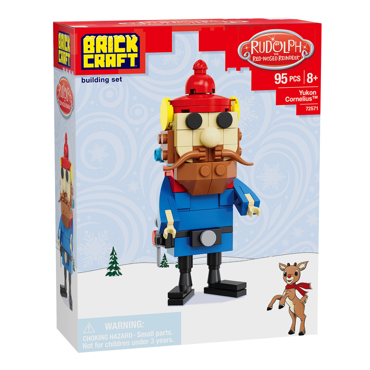 Brickcraft building set packaging featuring a character with a red hat and blue coat, Rudolph the Red-Nosed Reindeer logo, and a deer on a white background.